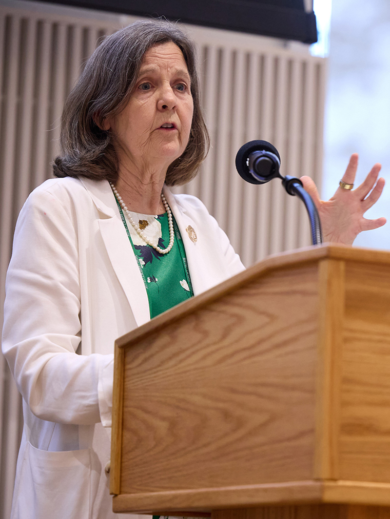 Cristle Collins Judd speaks at a podium