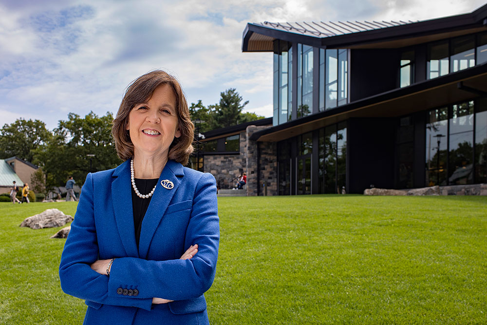 President Cristle Collins Judd outside the Barbara Walters Campus Center