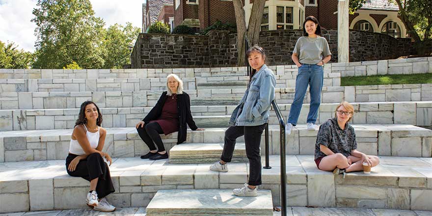 Faculty member with students