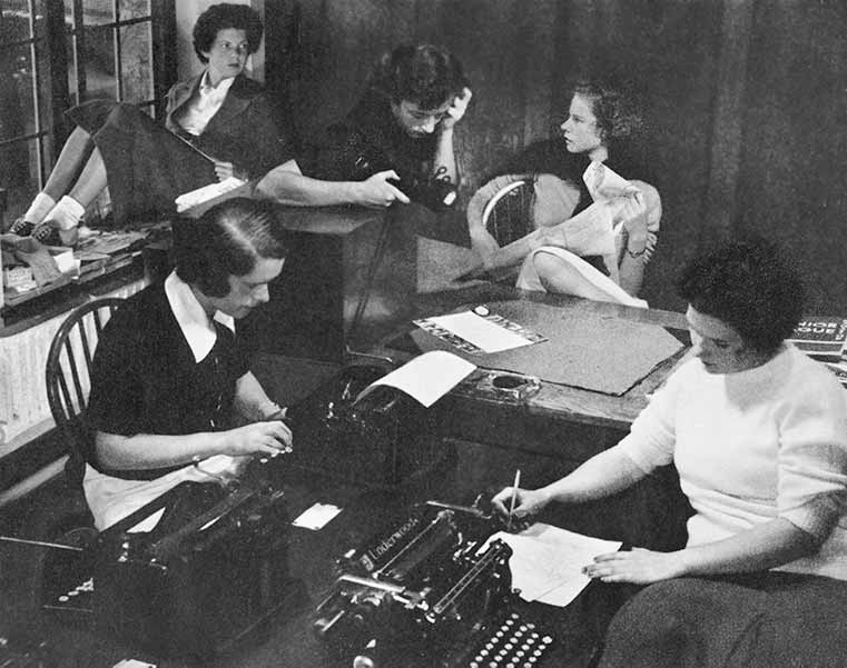 Students working in publication office