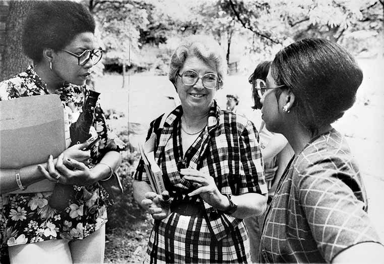 Gerda Lerner with two students