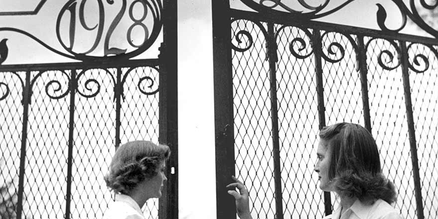 Archival photo: students standing at Westlands Gate