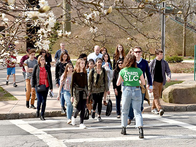 Campus tour crossing the street