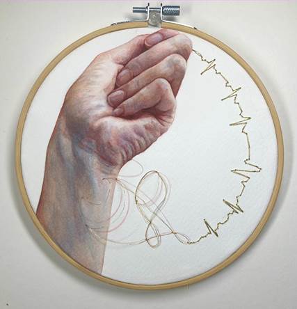 Embroidery hoop with a realistic hand holding thread, creating a heart rate pattern.