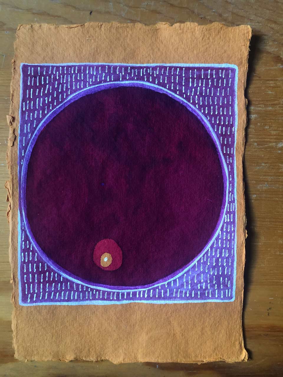 Abstract art on textured paper with a large maroon circle inside a purple-bordered square, featuring small white dashes and a small red dot.