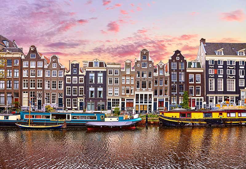 Photo of the water and boats in Amsterdam, Netherlands