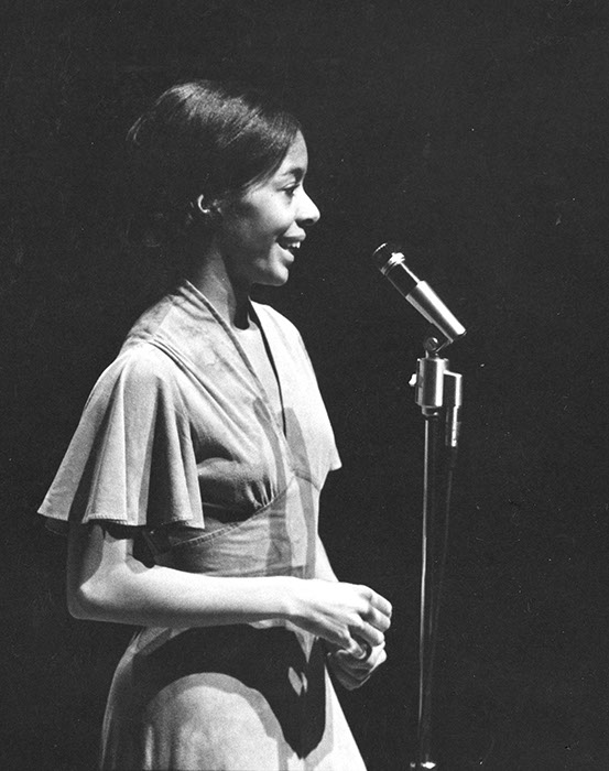  Carolyn Adams ’65 speaking at a dance performance that she choreographed in 1962 titled “The Struggle: Two Concepts”. Photographer Unknown. (Sarah Lawrence College Archives