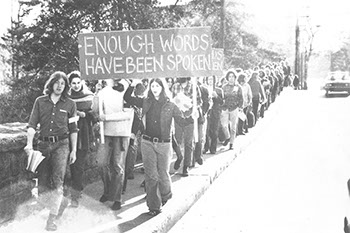 Students marching over Palmer Avenue Bridge during the Silent Peace Vigil, April 21, 1972. Photographer Unknown. (Sarah Lawrence College Archives)