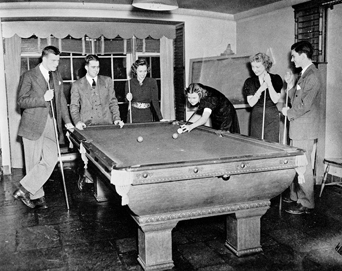  Marjorie Rile '41, Dorothy Dot Hodge '41, and Jo Hill '41 play pool with their dates during a Sunday tea dance. Sarah Lawrence College Yearbook 1938-1939.