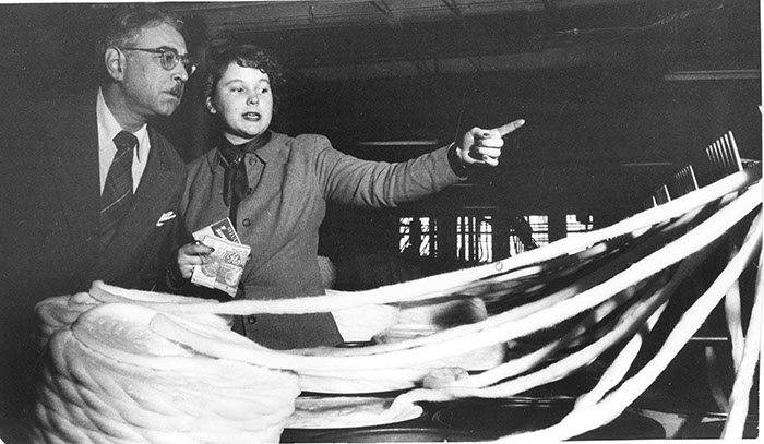  Bert James Loewenberg with Judith Thompson '54 visiting a textile mill during the 1951 trip.