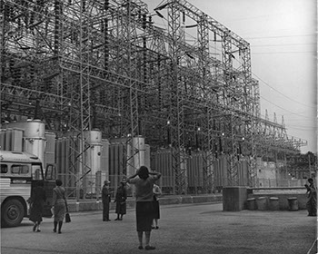 Visit to a plant during the 1955 trip. Photographer unknown.