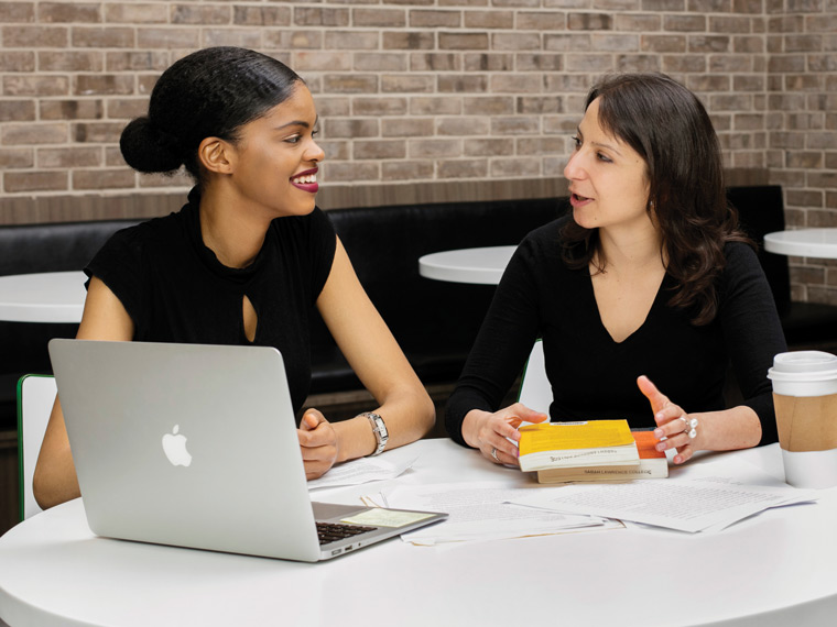 Student and faculty member in discussion