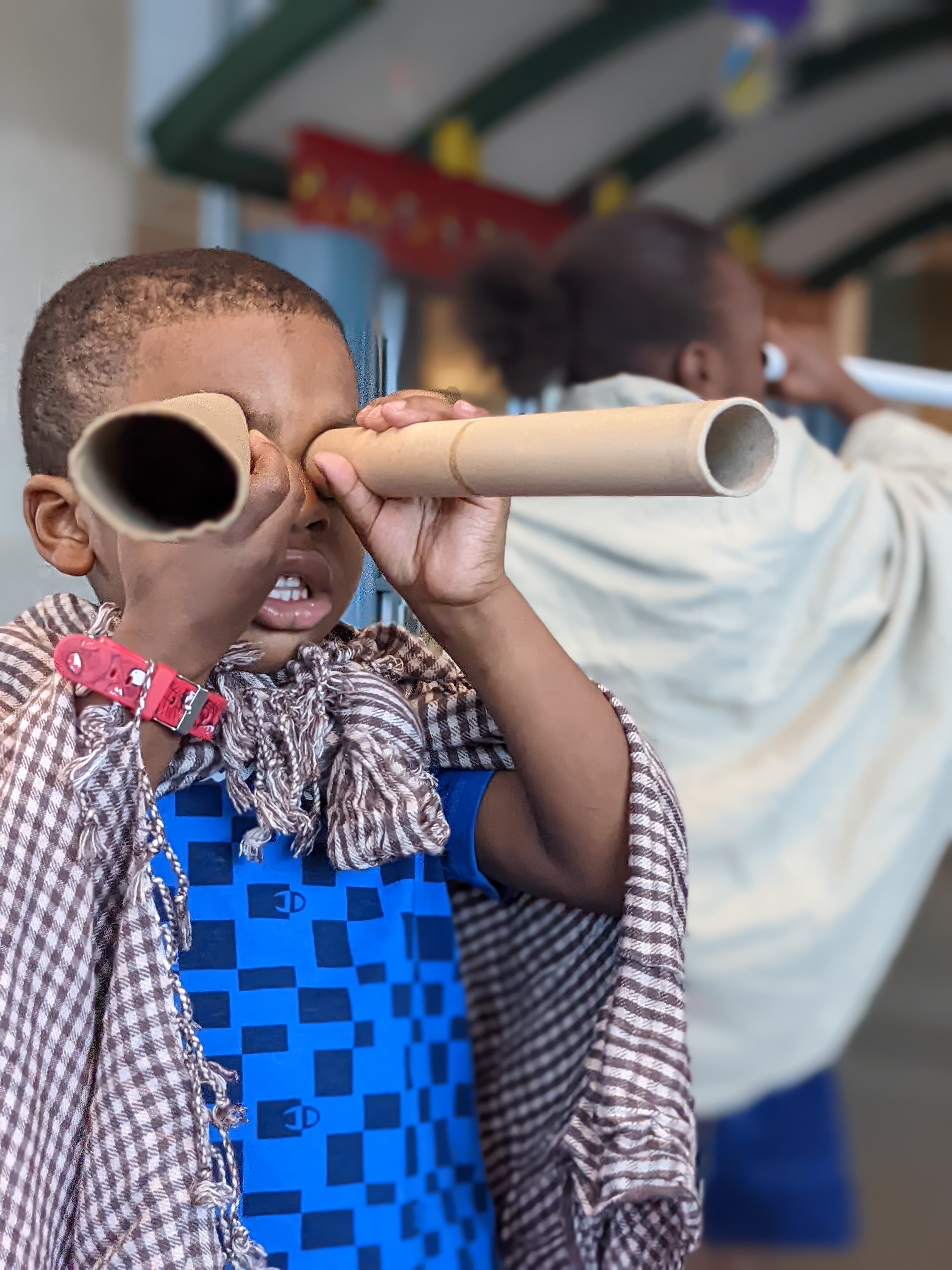 Child participating in a Community Adventure Play Experience (CAPE)