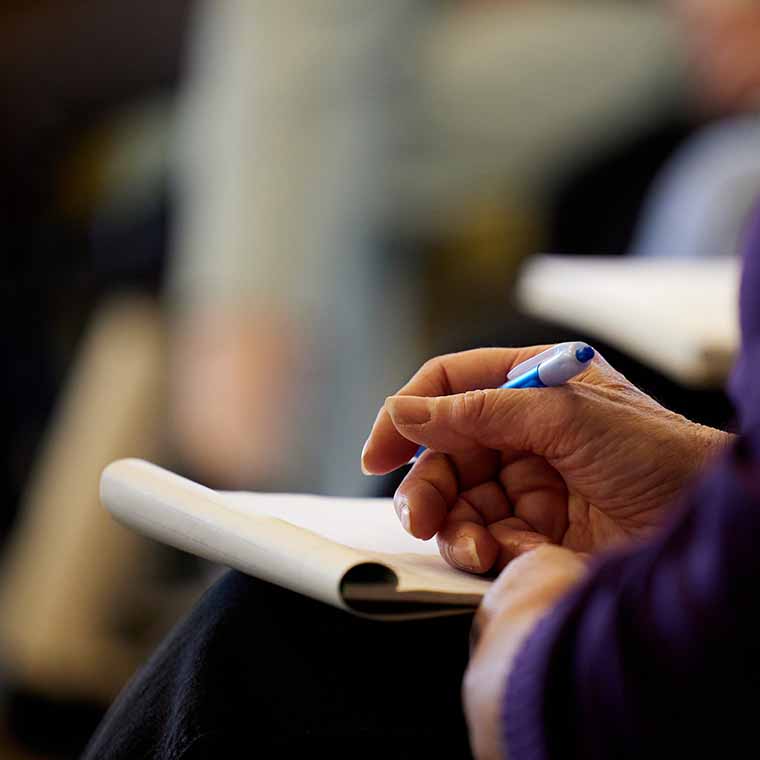 closeup of handwriting in journals