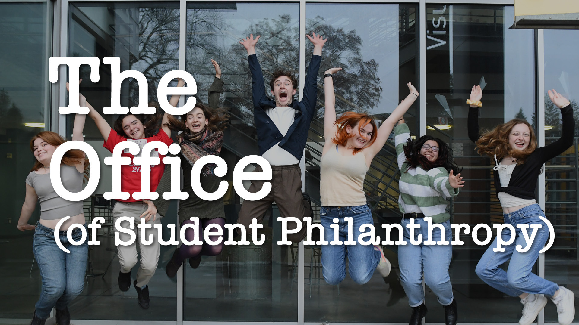 7 students jumping in the air with text The office of student philanthropy superimposed