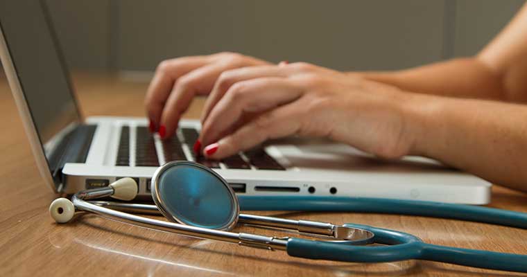 laptop/stethoscope
