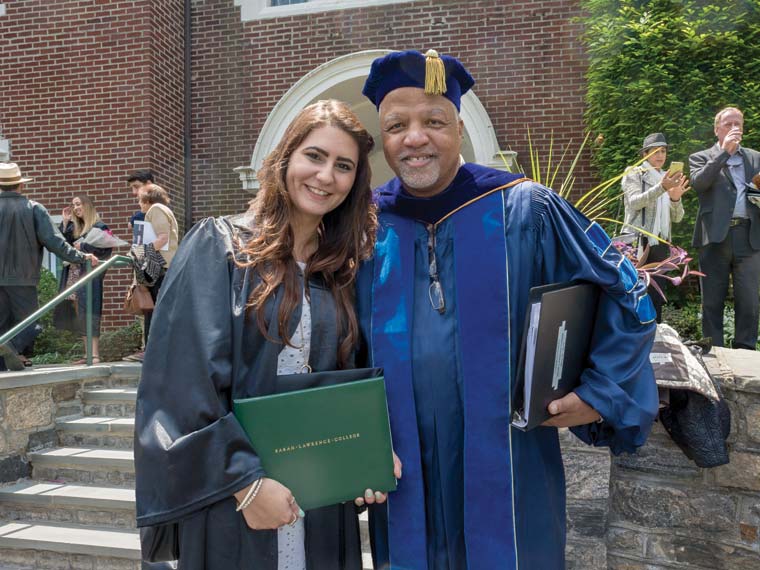 Green’s respect for students was reflected in his meticulous pronunciation of graduates’ names at commencement, even learning to sign a deaf student’s name one year. Here, he shares a celebratory moment with Bayan Baker ’15. Photo: Quyen Nguyen