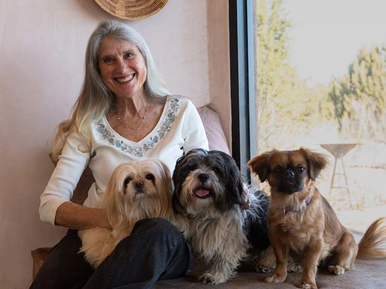 Jana de Peyer with her dogs Sange, Paco, and Lula