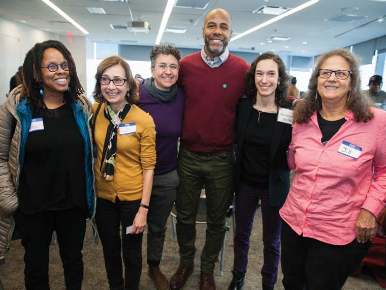 Photo of group of people standing together