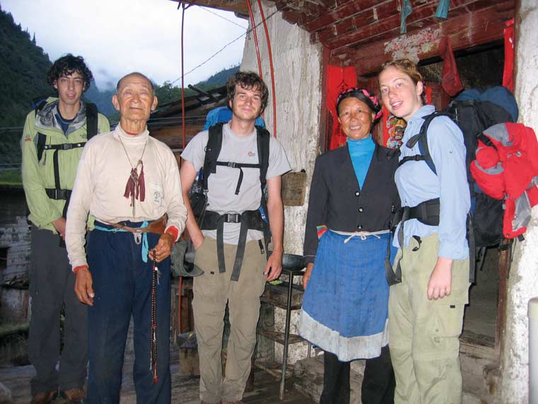 Samuel Stein ’05, William Rhodes ’07, and Klinger getting to know their hosts on a research trip with Muldavin in ethnically Tibetan Deqin County near the Meili Glacier