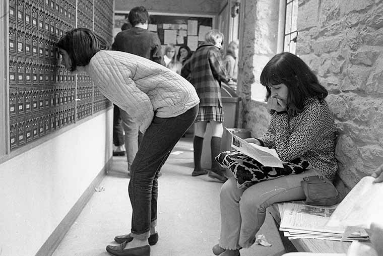 archival photo of students in post office