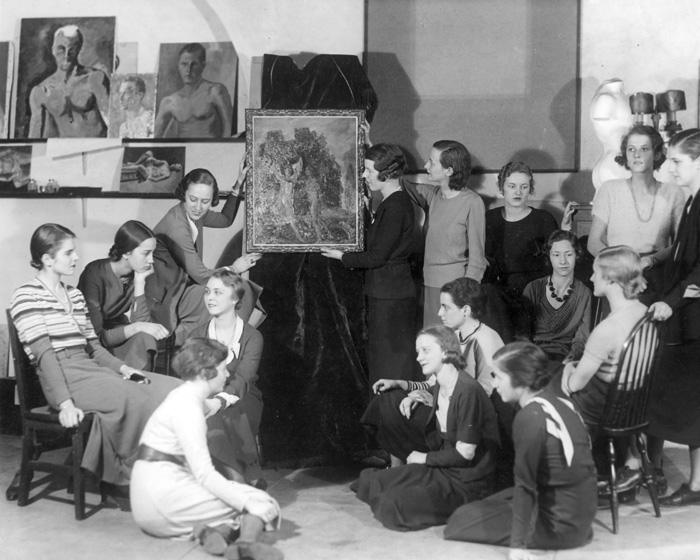 archival image of students in community space