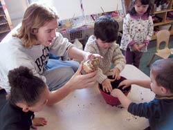 Graduate student working with ECC students