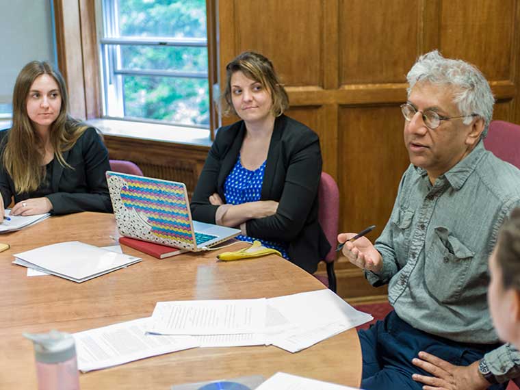 Faculty with students in seminar