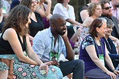 Couple holding hands at reunion