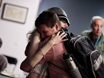 Photo of two people hugging