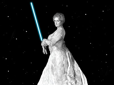 Photo of Sarah Lawrence holding a lightsaber in front of a black starry sky