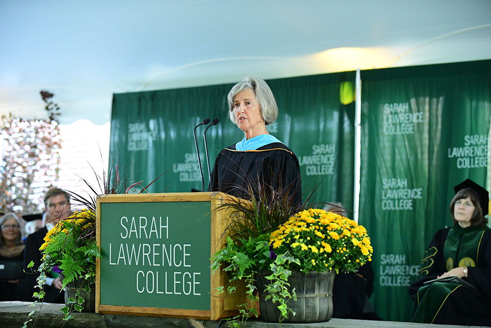 Sarah Gund at podium during inauguration