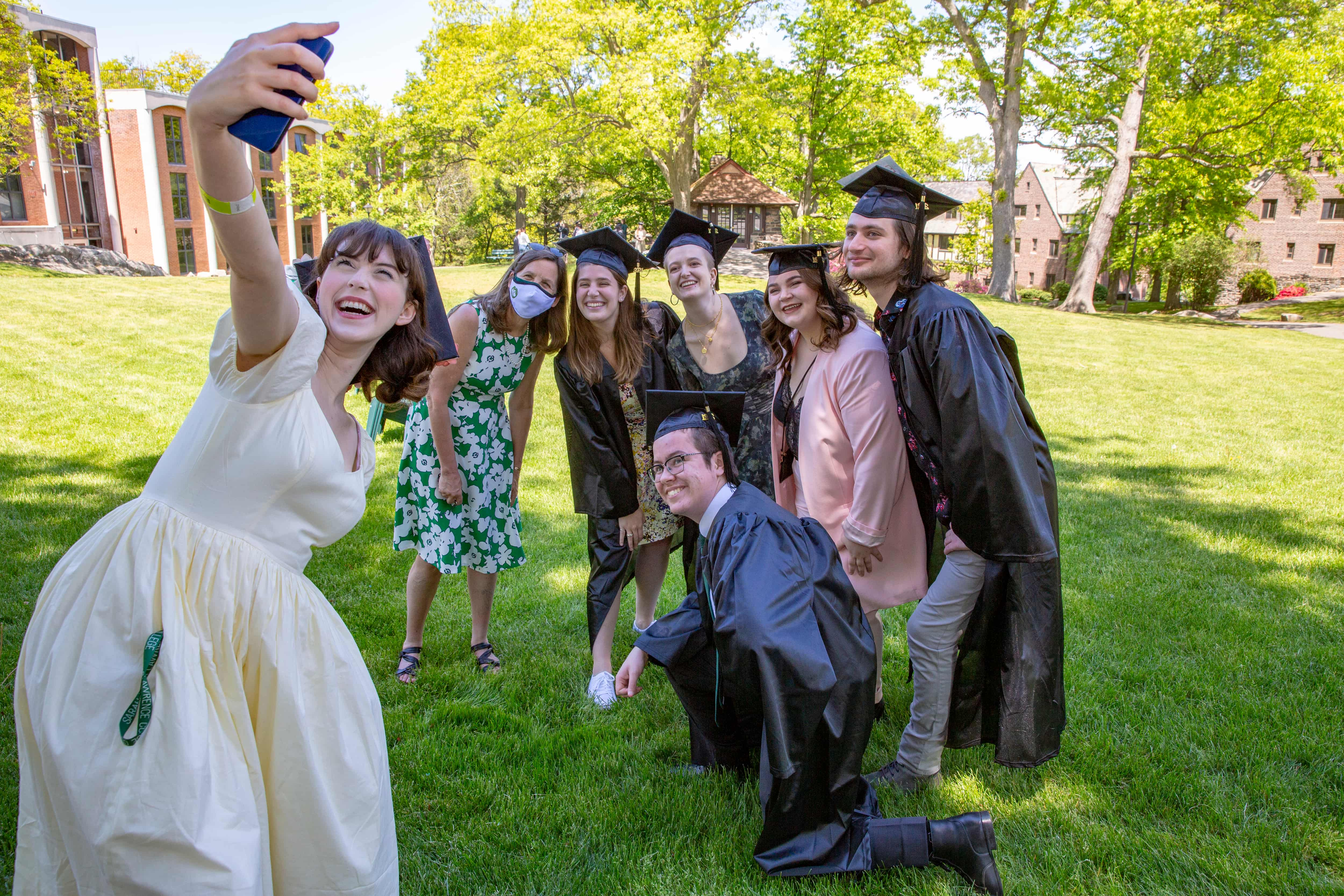 Students snapped selfies during a picnic on Westlands Lawn following the ceremony