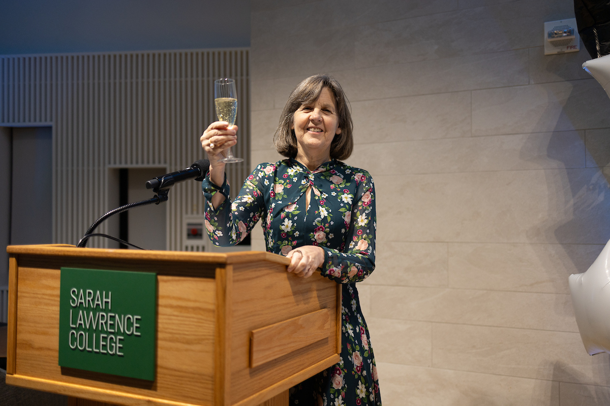 President Judd toasting at the podium