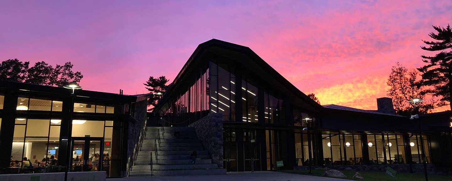 The Barbara Walters Campus Center at sunset