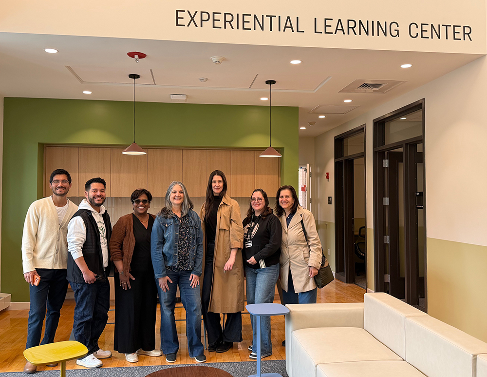 The Career Services, Community Partnerships, Global Education, and SLC EmbeddED staff inside the Experiential Learning Center