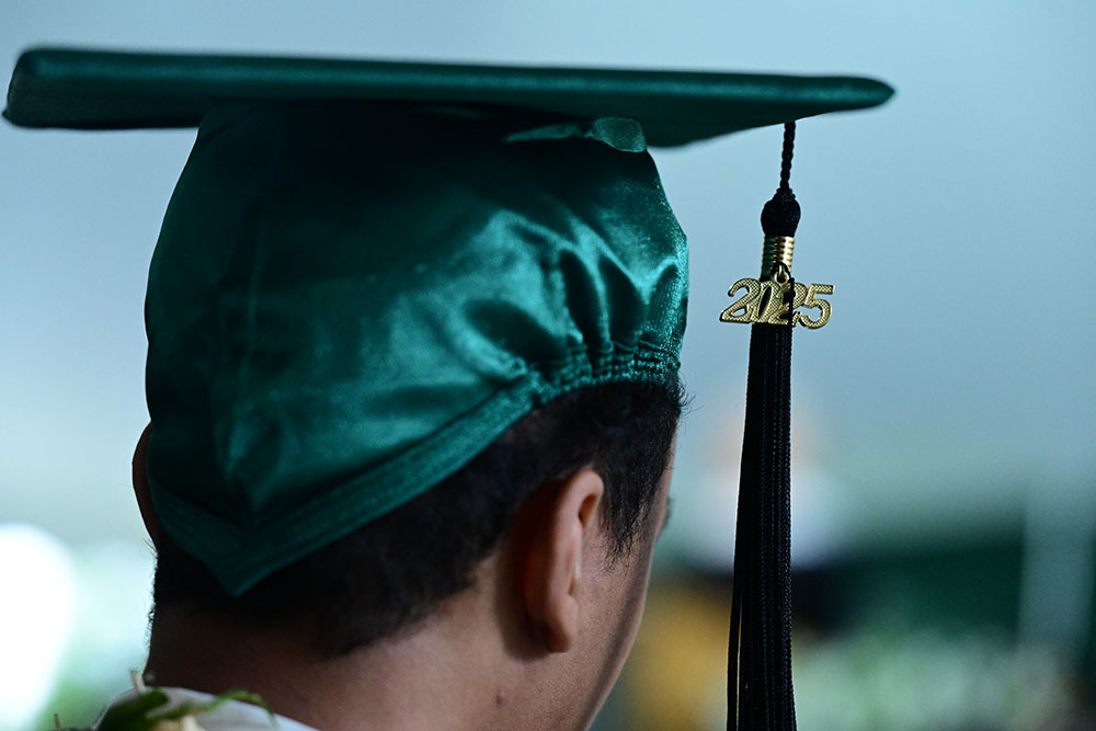 close up of graduate with 2025 tassel