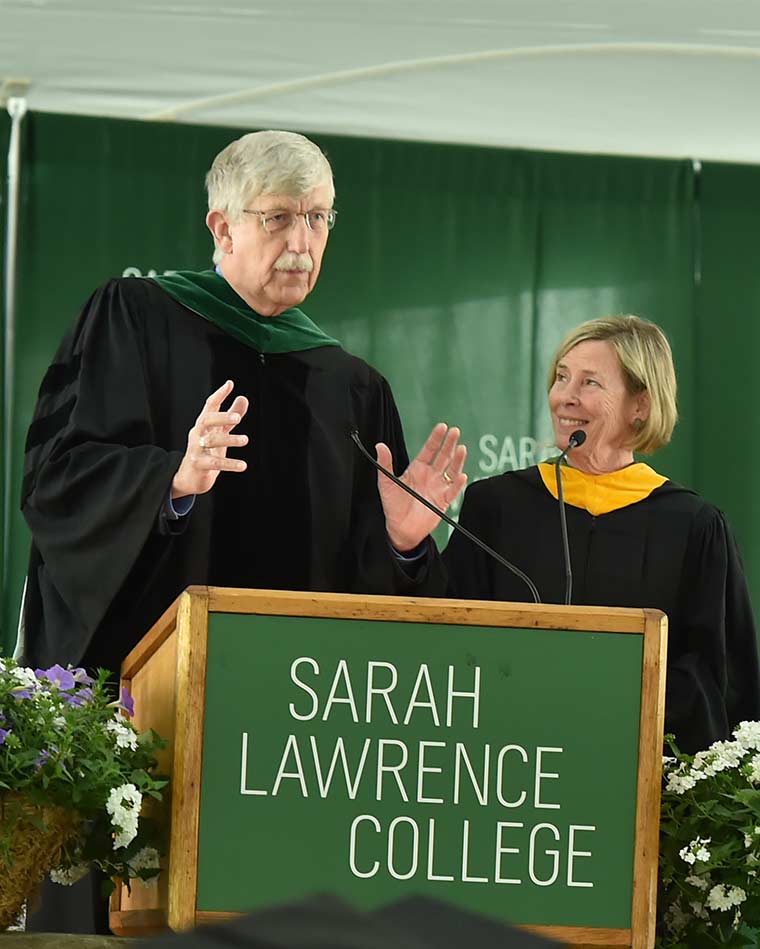 Portrait of Baker and Collins at lectern