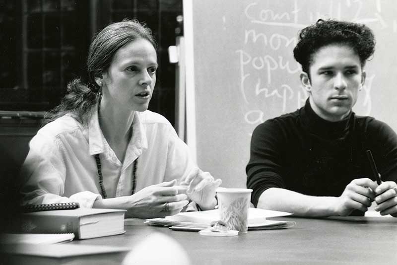 Ann Lauinger in class with a student