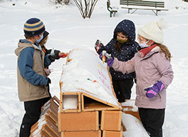 Children playing in the snow