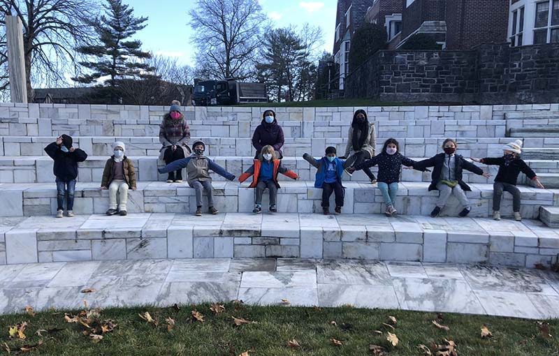 Early Childhood Center students explore the Remy Theatre on campus