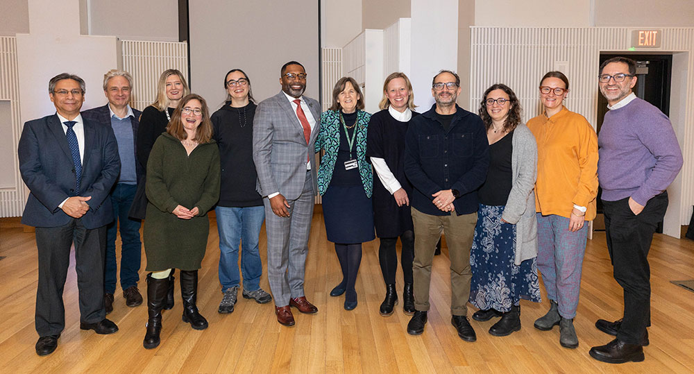 Group photo of people smiling at the camera