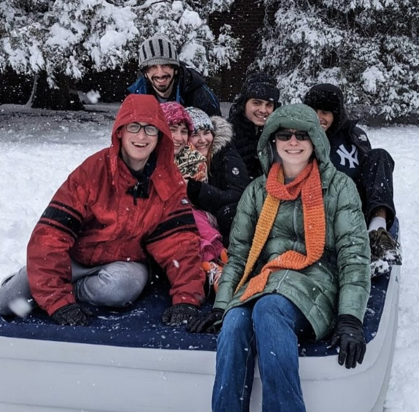 Students playing in the snow