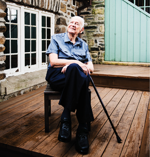 Wachs sitting with his cane