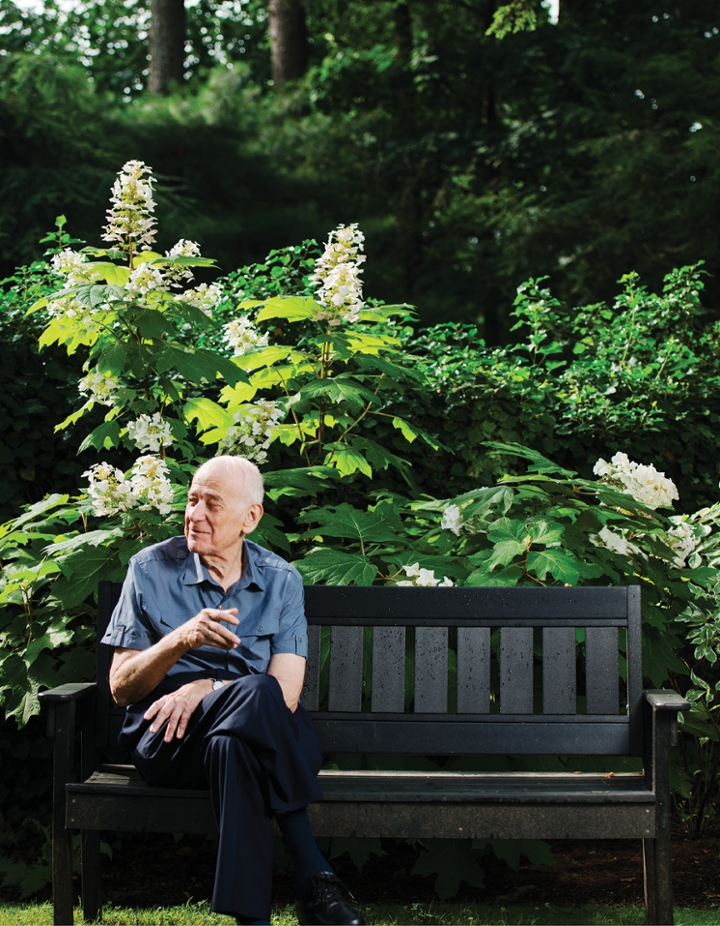 Ilja Wachs sitting on a garden bench