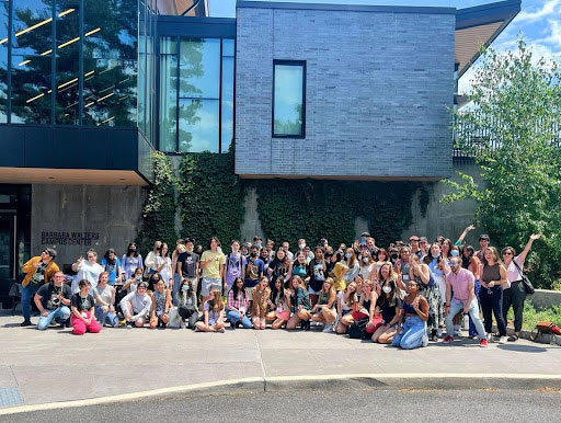 Group of student writers outside the campus center
