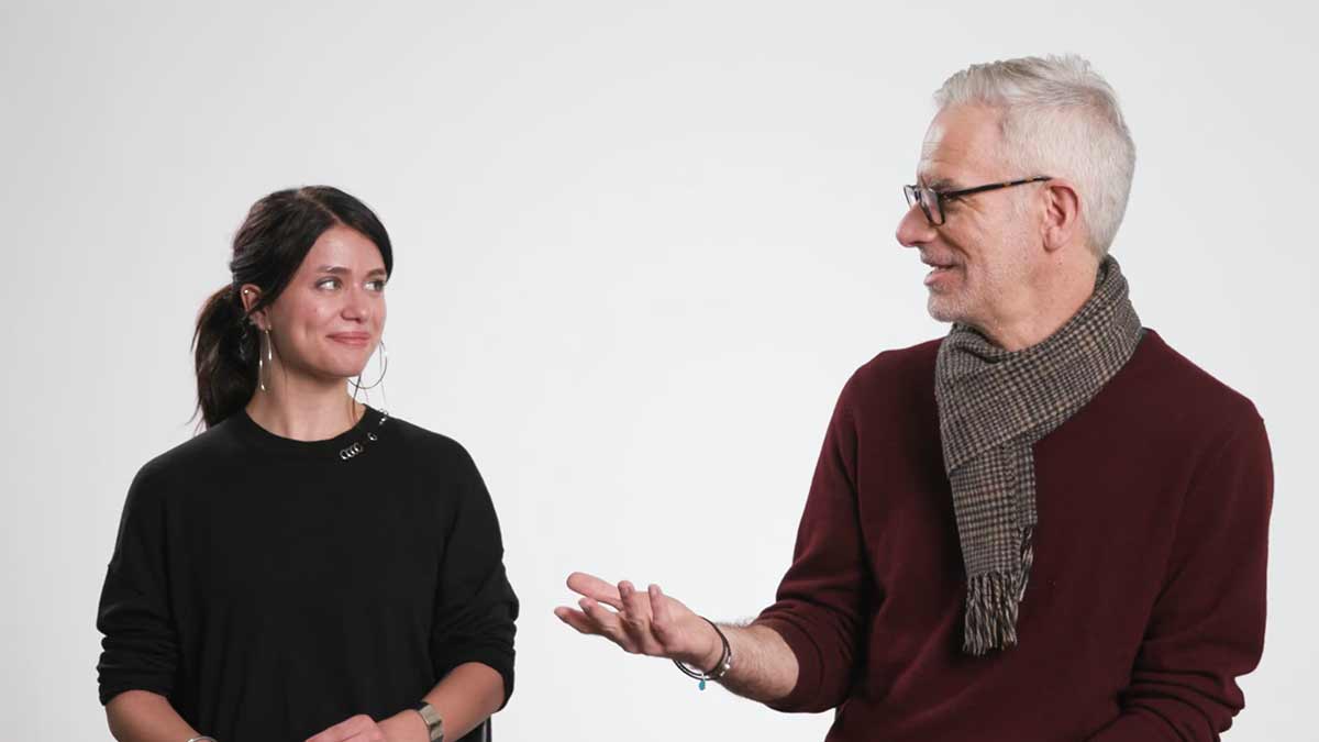 woman and a man sitting talking