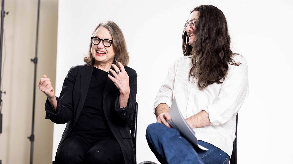 two people sitting talking