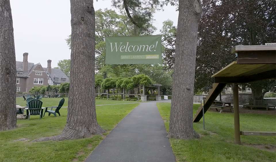 SLC campus with welcome alumni sign