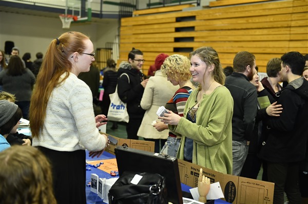 student asking questions at the annual Student Organization Fair